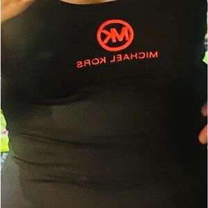 Michael Kors black mini dress with red logo